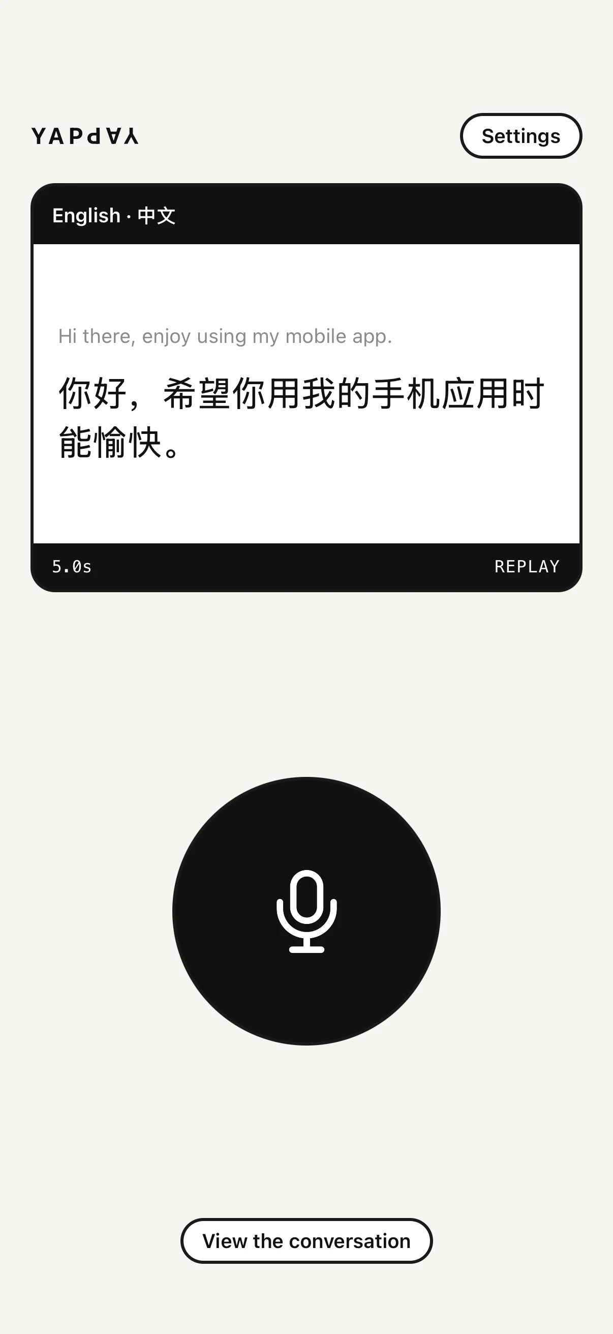 YapYap translating “Hi there, enjoy using my mobile app.” into Chinese: 你好,希望你用我的手机应用时能愉快。, above the round talk button.